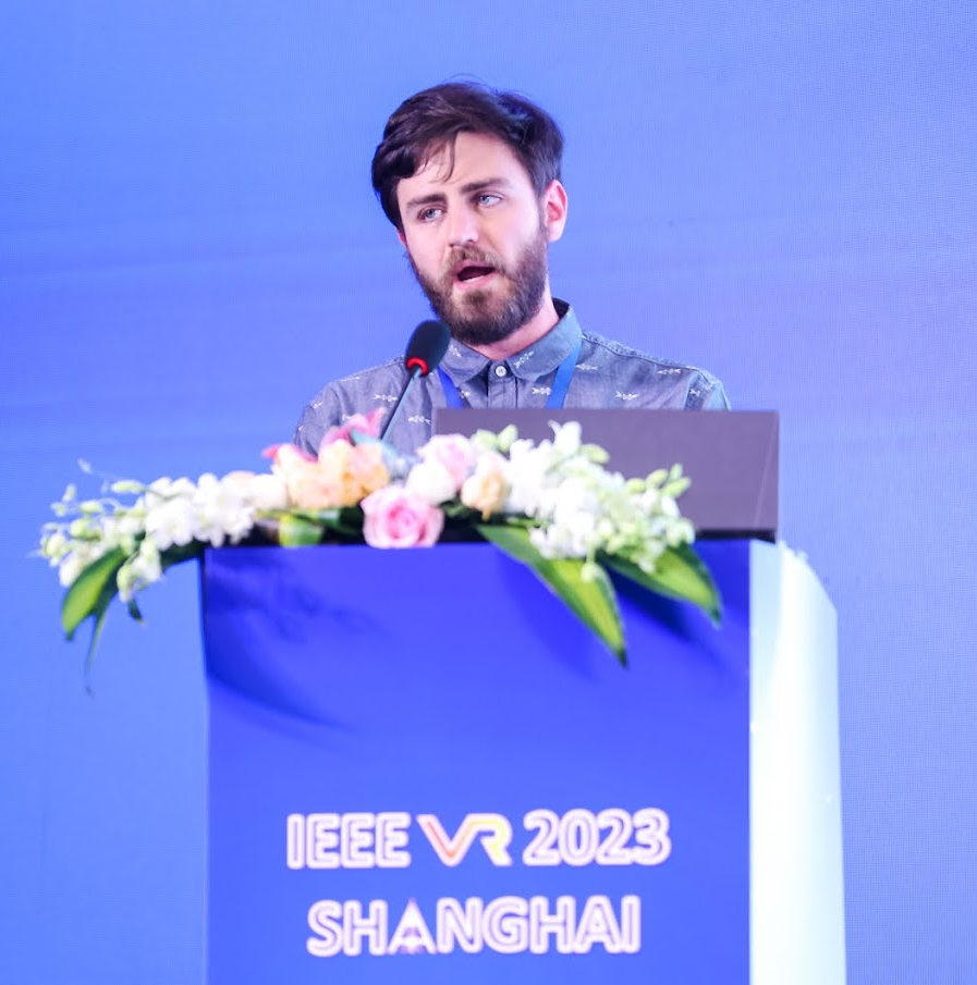 Photo of the researcher holding a microphone